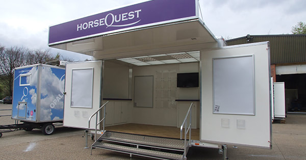 This 4.6m exhibition trailer with a curved, front aero panel, has a fresh, clean feel. It is designed to promote the Horse Quest.